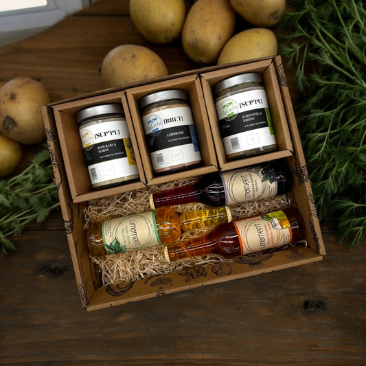 Suppe, Leberkäse und Limo in einer Box