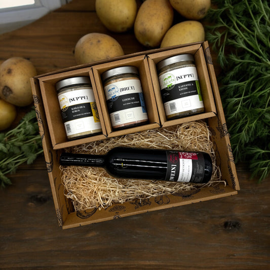 Suppe, Leberkäse und eine Flasche Wein